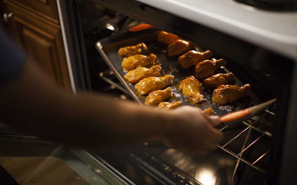 marijuana-infused spicy chicken wings cooking