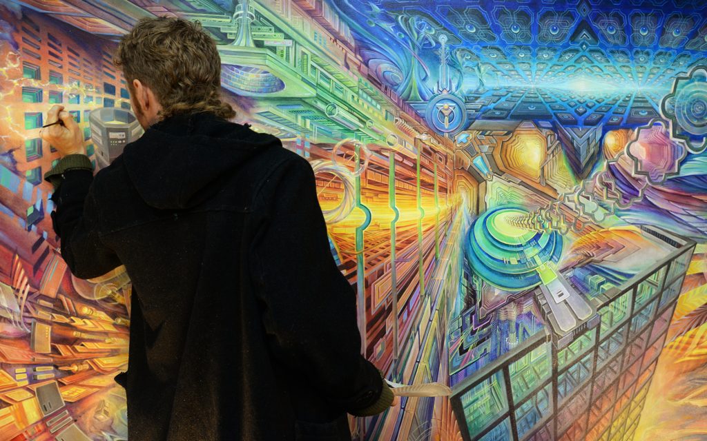 Artist Seth McMahon, of Oakland, California finishing up a painting he worked on for about 4 months during The Emerald Cup held at the Sonoma County Fairgrounds in Santa Rosa, California. (Erik Castro for Leafly)